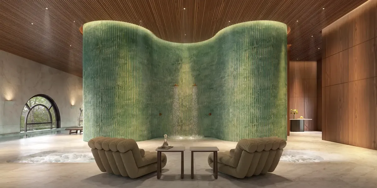 Spa do Edifício Adolpho Lindenberg Moema com parede curva em quartzo verde, duchas cênicas e hidromassagem, em Moema, São Paulo